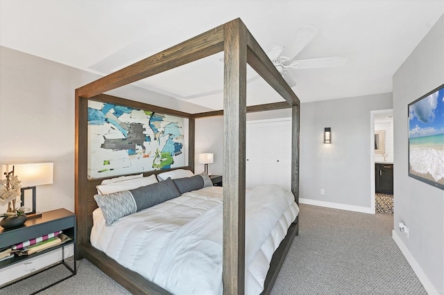 bedroom featuring connected bathroom, ceiling fan, and carpet