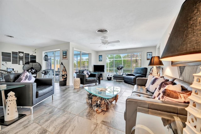 living room featuring ceiling fan