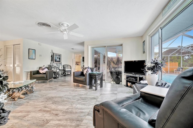 living room with ceiling fan