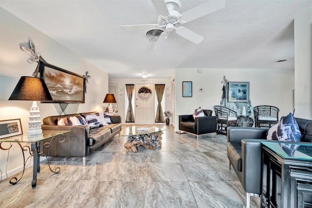 living room with ceiling fan