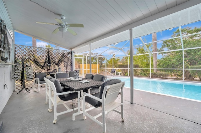 exterior space featuring vaulted ceiling, a wealth of natural light, and ceiling fan