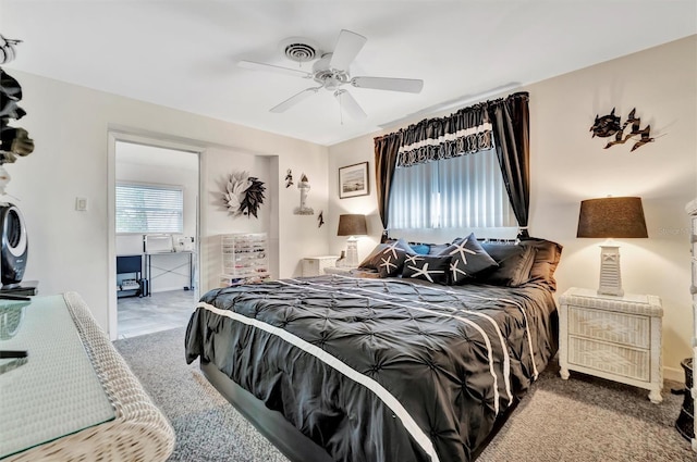 carpeted bedroom featuring ceiling fan