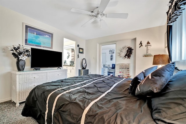 carpeted bedroom featuring ensuite bath and ceiling fan