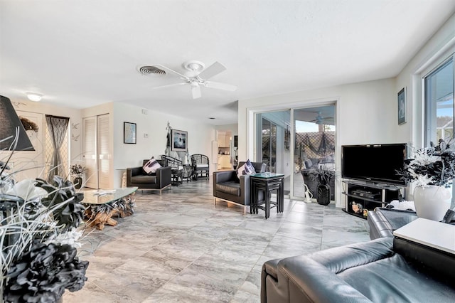 living room with ceiling fan