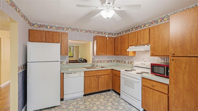 kitchen featuring ceiling fan, white appliances, and sink