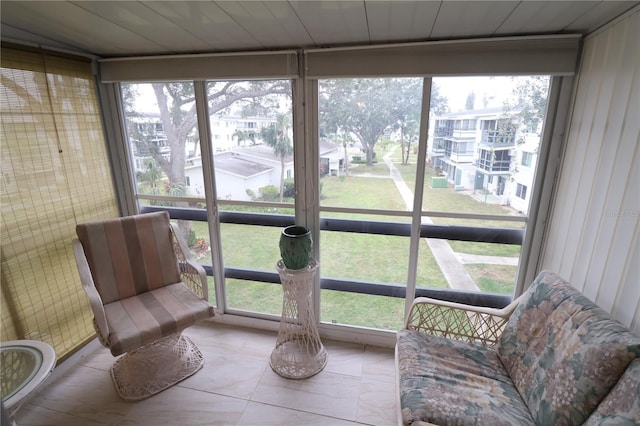 sunroom with wood ceiling