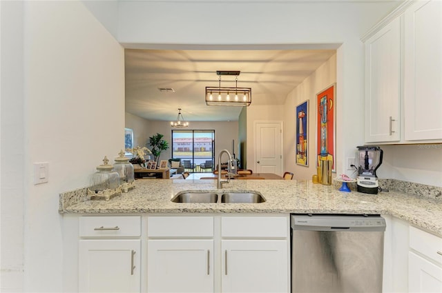 kitchen featuring sink, stainless steel dishwasher, kitchen peninsula, and white cabinets