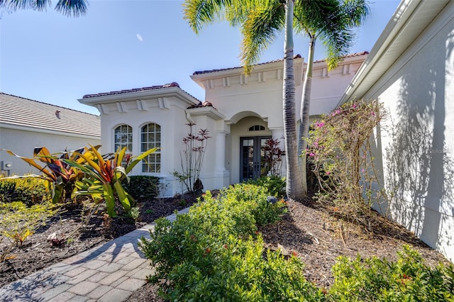 mediterranean / spanish house with french doors