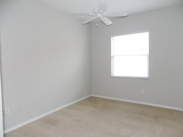 empty room featuring ceiling fan