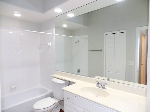 full bathroom with shower / tub combination, vanity, and toilet