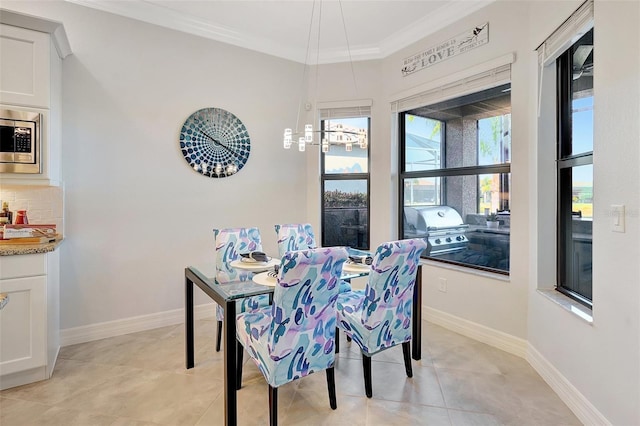 tiled dining room with crown molding