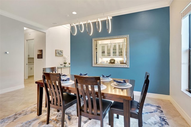 dining room with ornamental molding