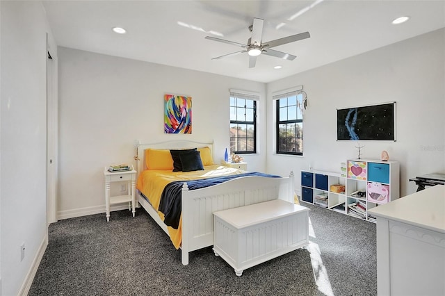 carpeted bedroom featuring ceiling fan