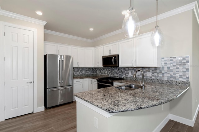 kitchen with dark wood-type flooring, a sink, light stone counters, white cabinetry, and stainless steel appliances