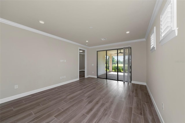 unfurnished room featuring crown molding, ceiling fan, and dark hardwood / wood-style flooring