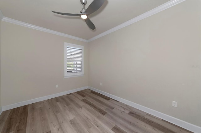 empty room featuring crown molding, light wood-style floors, baseboards, and ceiling fan