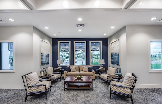 living area featuring recessed lighting, visible vents, baseboards, and carpet flooring