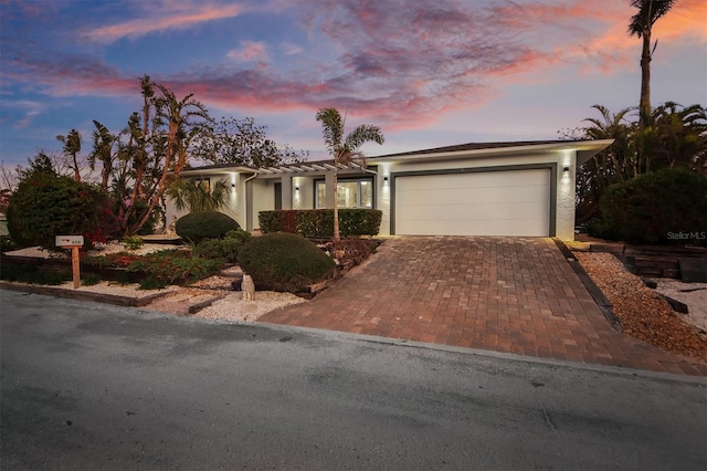 single story home with a garage