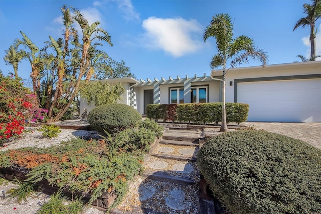 view of front of property featuring a garage