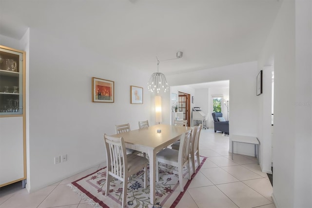 dining space with light tile patterned floors