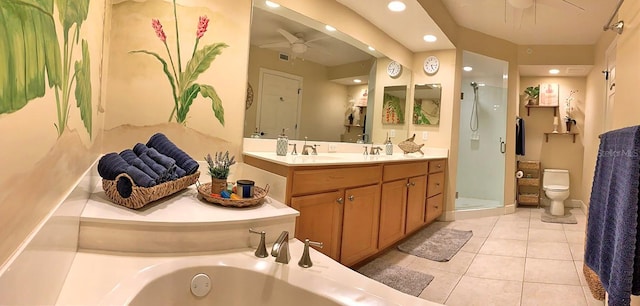 full bathroom with tile patterned flooring, vanity, separate shower and tub, ceiling fan, and toilet