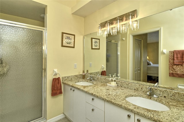 bathroom with vanity and walk in shower