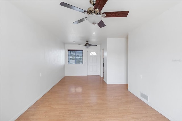 unfurnished room featuring light hardwood / wood-style flooring