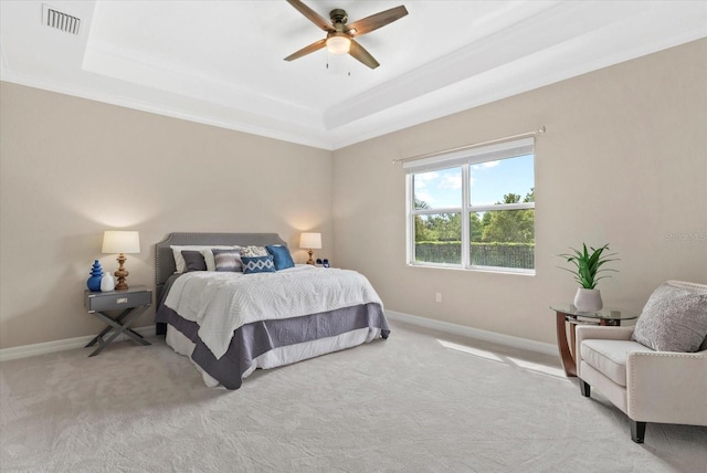 12029 Perennial Pl, Lakewood Ranch, FL 34211 - carpeted bedroom with a tray ceiling, ornamental molding, baseboards, and ceiling fan