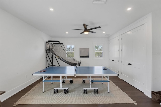 playroom with dark wood-type flooring, recessed lighting, visible vents, and baseboards