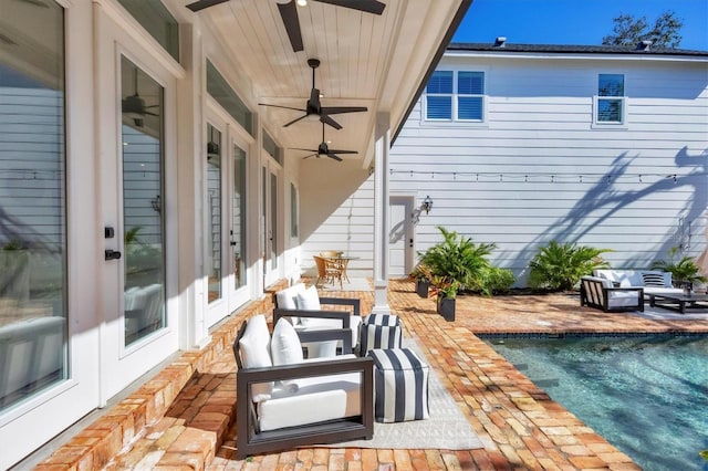 view of patio with an outdoor hangout area, an outdoor pool, and french doors