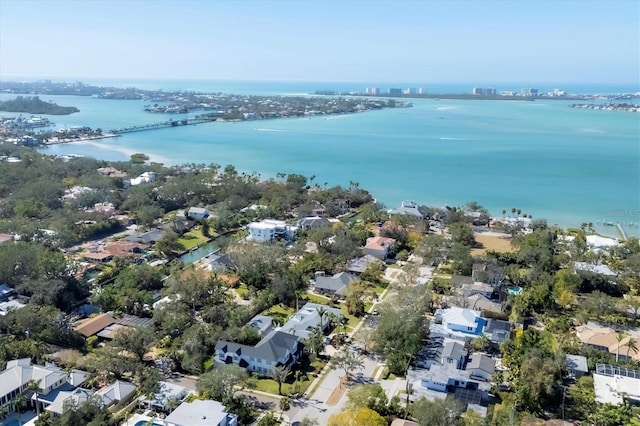 bird's eye view featuring a water view and a residential view