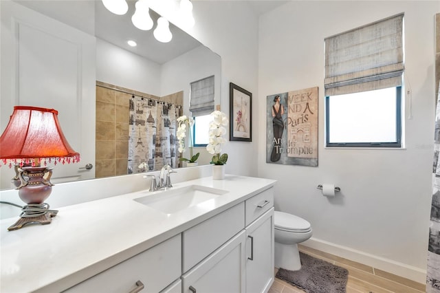 bathroom featuring vanity, toilet, a shower with shower curtain, and wood-type flooring