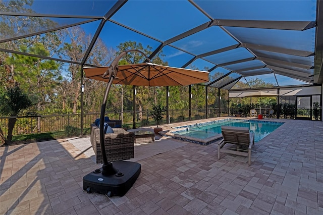 view of pool featuring outdoor lounge area, a lanai, and a patio