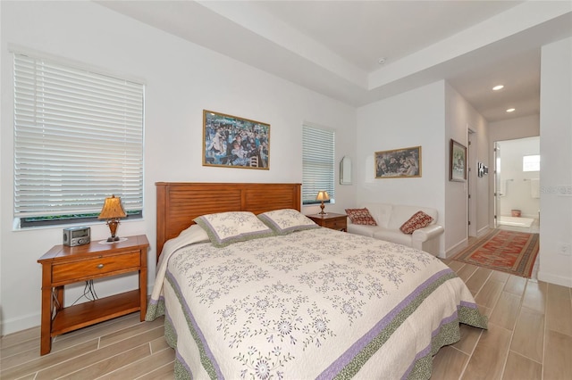 bedroom featuring connected bathroom