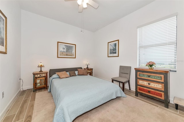 bedroom featuring ceiling fan and light wood-type flooring