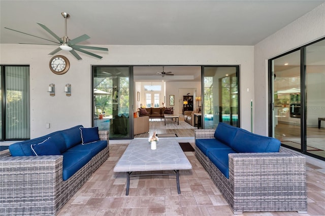 view of patio / terrace featuring an outdoor living space and ceiling fan