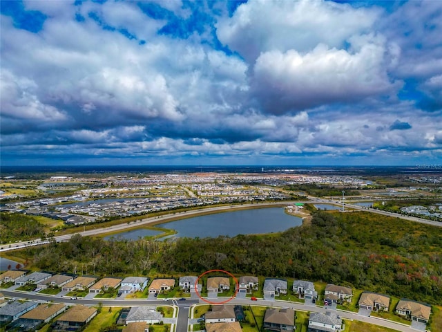 birds eye view of property featuring a water view