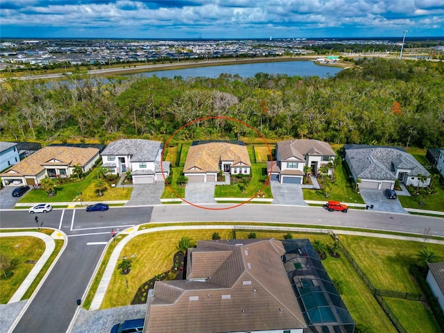 bird's eye view with a water view