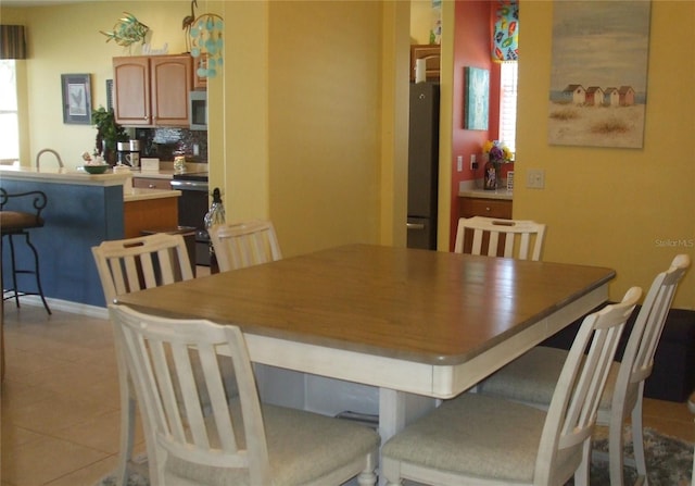 view of tiled dining room