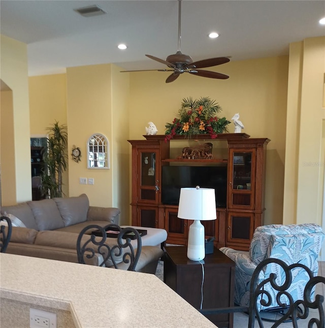 living room with ceiling fan