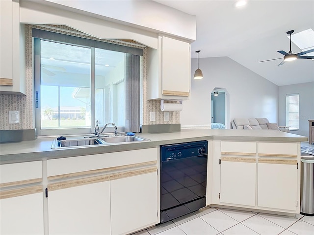 kitchen with decorative light fixtures, black dishwasher, sink, white cabinets, and ceiling fan