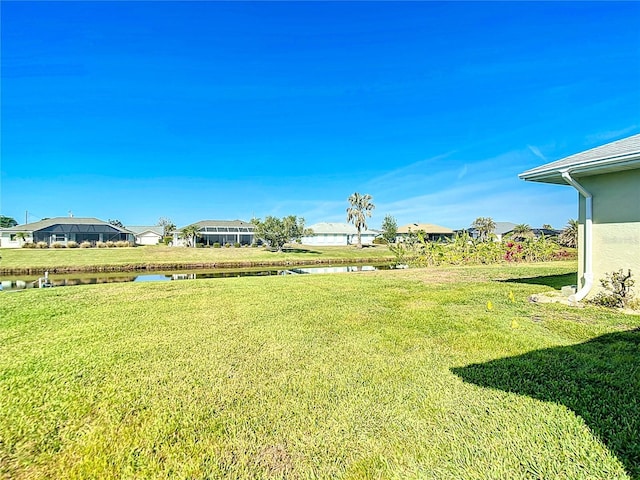 view of yard featuring a water view