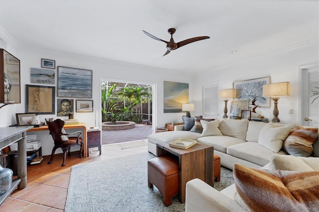 living room with crown molding, ceiling fan, and light tile patterned floors