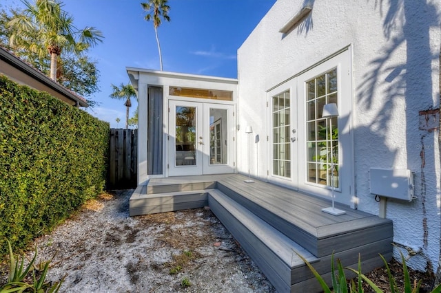 property entrance featuring french doors