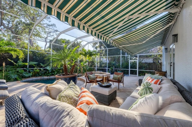 view of patio featuring an outdoor living space and a lanai