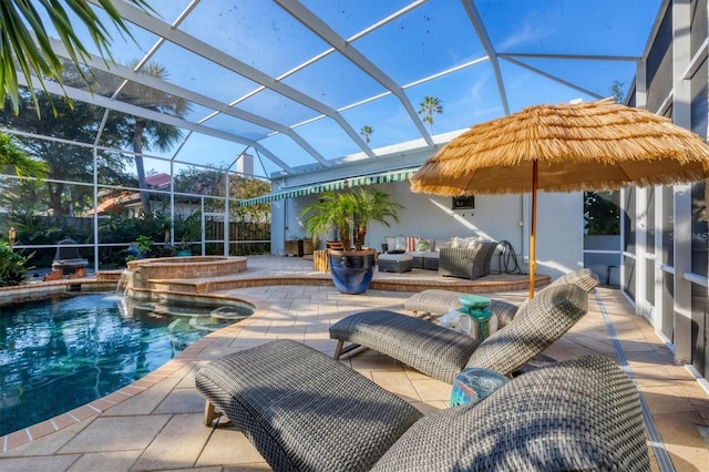 view of pool featuring a lanai, an outdoor hangout area, a patio area, and an in ground hot tub