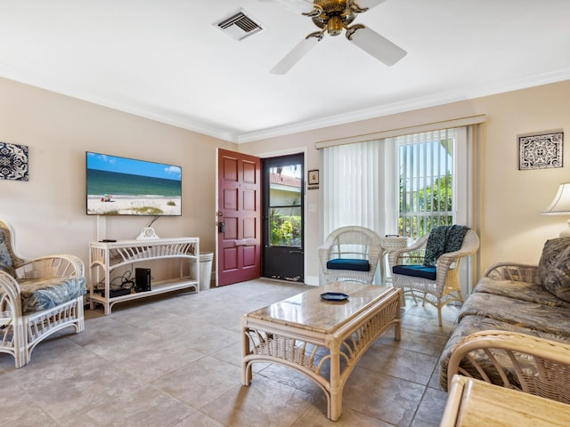 living room featuring crown molding and ceiling fan