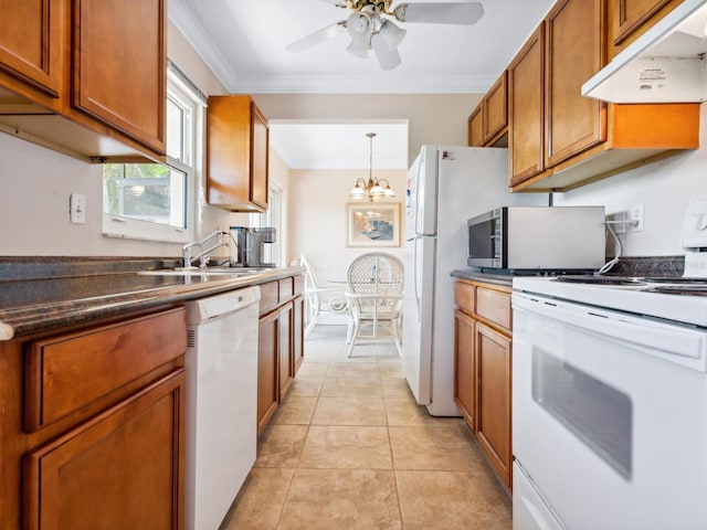 kitchen with light tile patterned flooring, decorative light fixtures, sink, ornamental molding, and white appliances