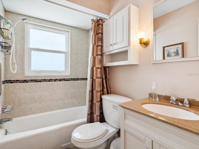 full bathroom with vanity, shower / tub combo with curtain, and toilet