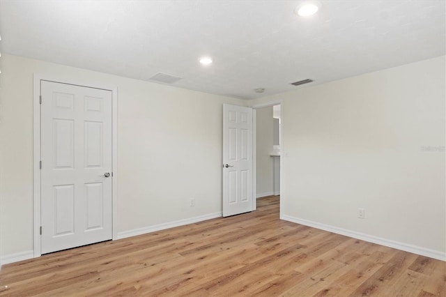 empty room featuring light hardwood / wood-style flooring